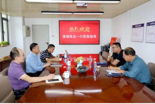酒钢宏兴股份副总经理周彪一行到访兰格集团